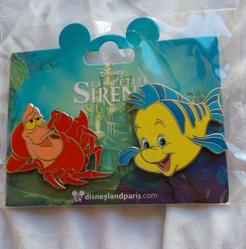 Pins Disney la petite sirène polochon et Sébastien
