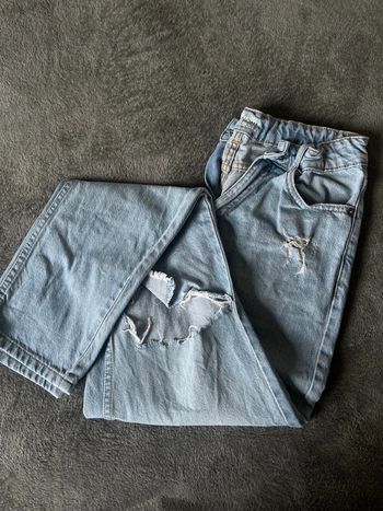 Jean boyfriend troué