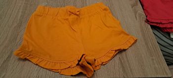 Short jamais porté jaune moutarde- orangé 92 C&A