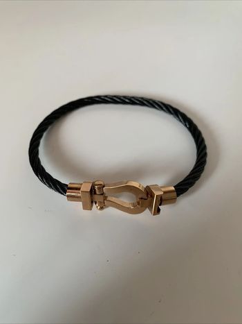 Bracelet fantaisie rigide noir et doré fermeture aimantée