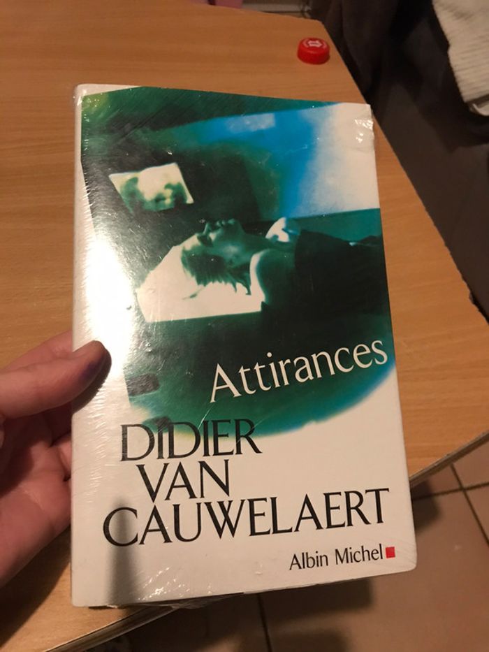 Livre  attirances neuf sous blister de Didier van cauwelaert