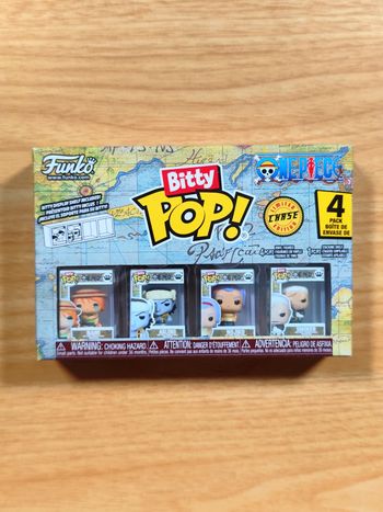 Boîte 4 Funko Bitty Pop! - One Piece - Nami, Arlong, Nojiko & Smoker (CHASE)