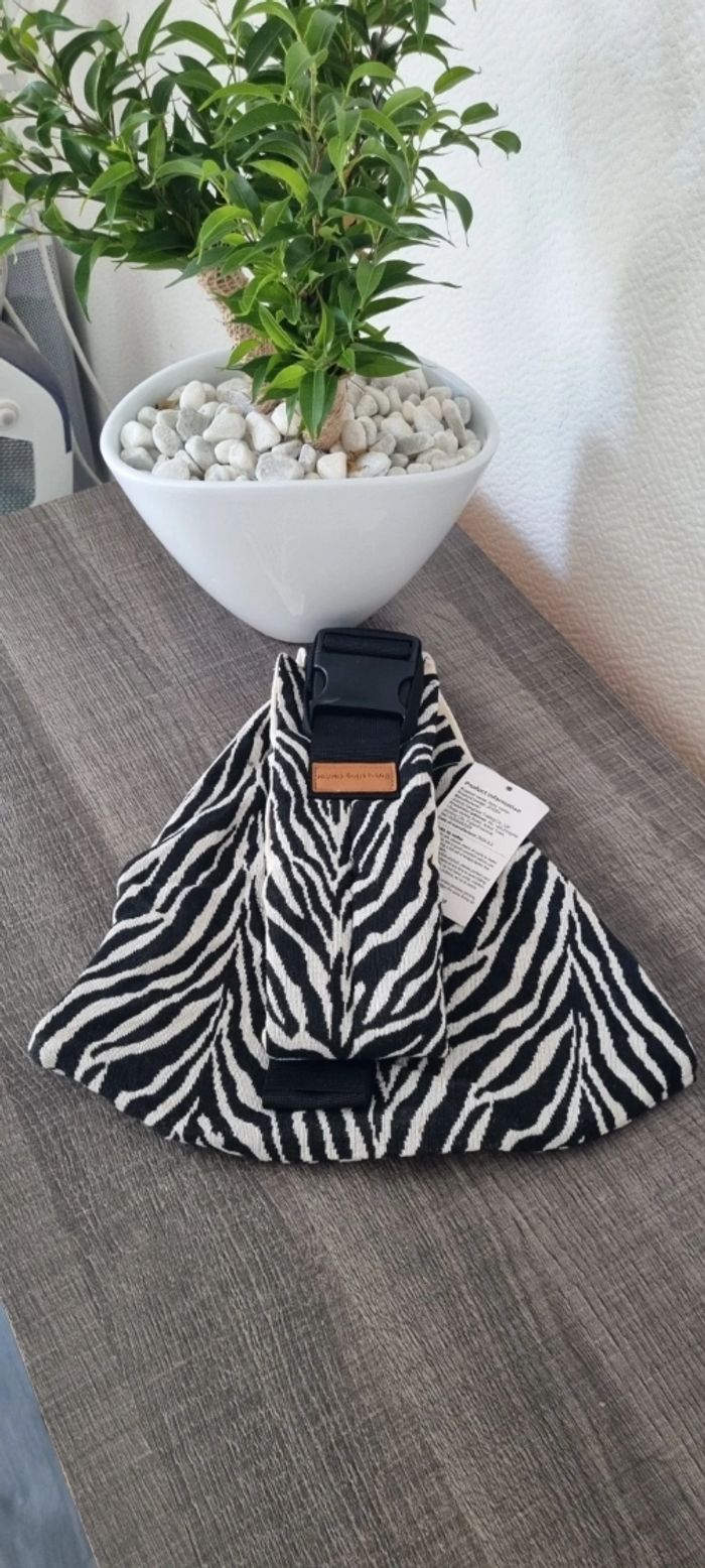 Très jolie porte bébé neuf (zebre) - photo numéro 5