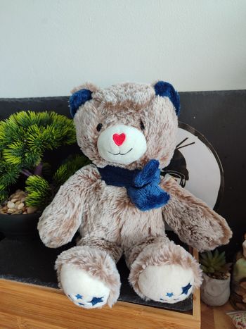 Peluche ours marron echarpe bleue Etoiles Françoise Saget blanc rouge PE0256