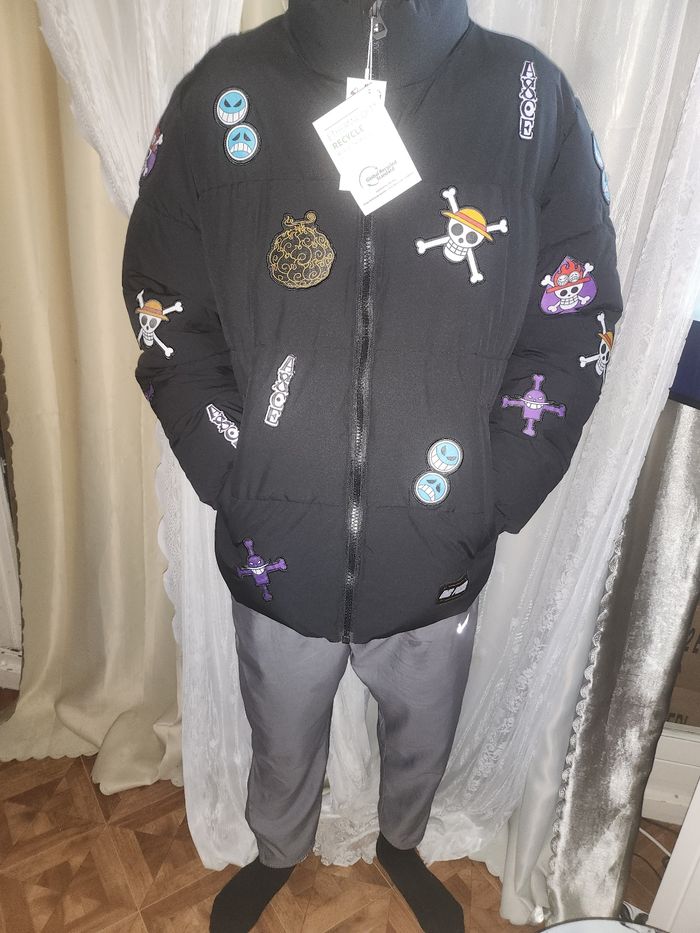 Doudoune one piece taille L Célio