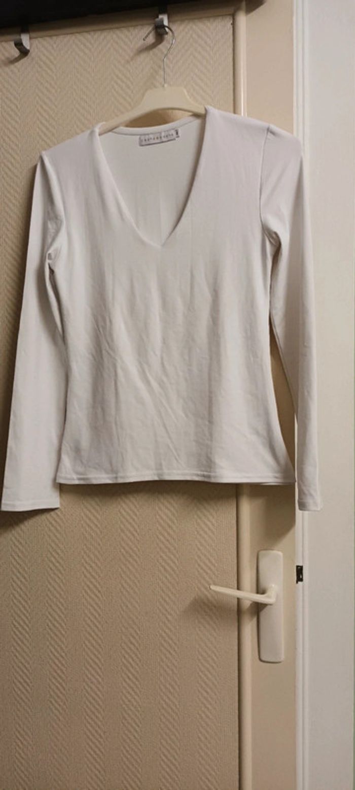 Haut moulant taille M. 1,5€.