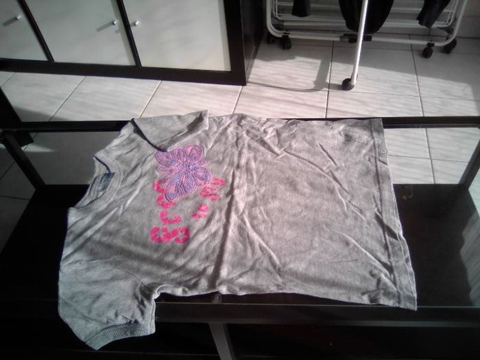 Tee shirt manches courtes. CHAMPION   9-10 ans