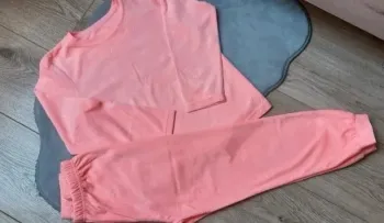 Pyjama licorne abricot fluo 7/8 ans en parfait état