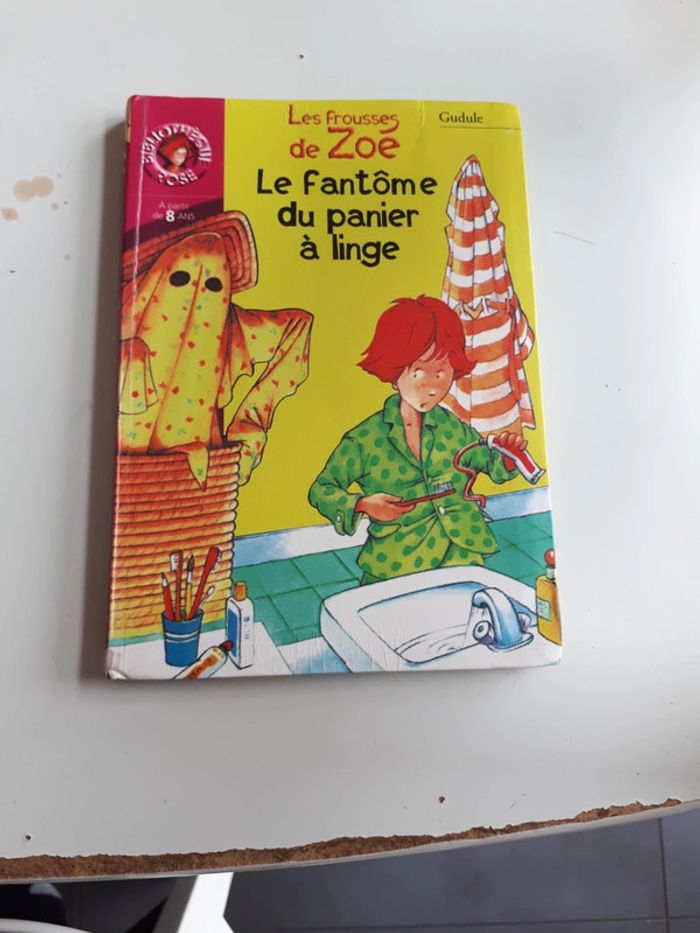Livre bibliothèque rose le fantôme du panier à linge