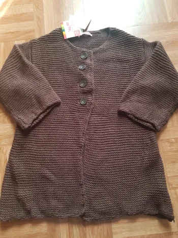 Boléro gilet 10 ans neuf