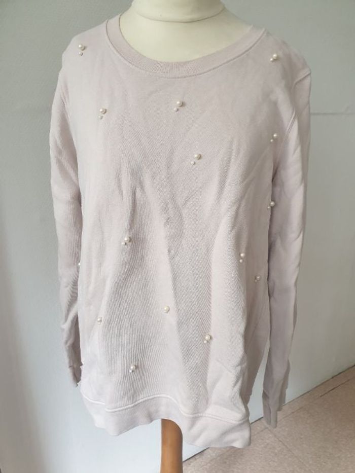 Pull rose pale et perles