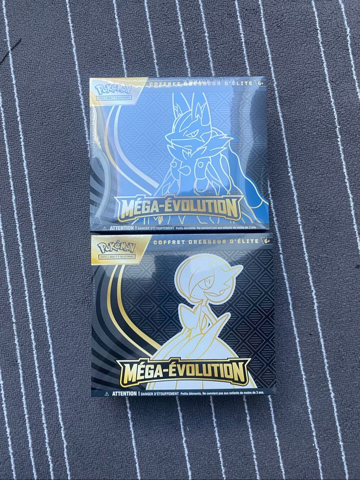 Lot de 2 Etb Pokemon mega evolution donc 1 avec trou et l’autre non