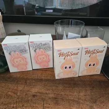 4 boîtes mystères popmart