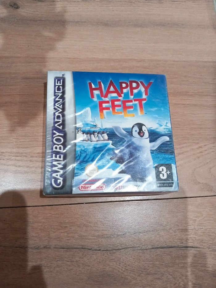 Jeu "Happy Feet" neuf