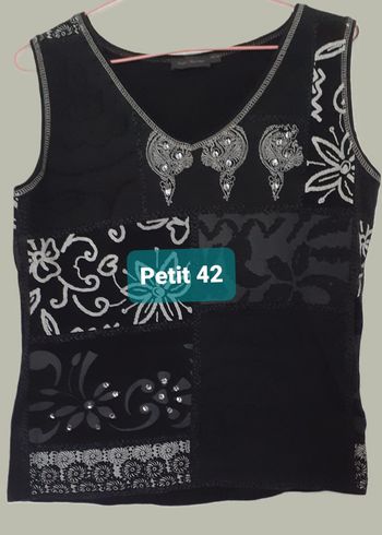 Débardeur noir avec sequins. Imprimé floral. Kiabi. Taille 42
