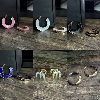 Boucle d’oreille fendi miumiu 