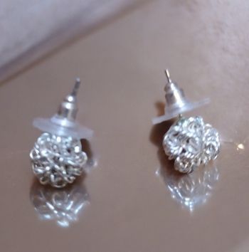 Boucle d'oreille argentée