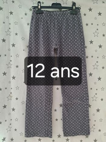 Pantalon taille élastique gris avec impression noir et blanche 12 ans Orchestra 
Très bon état ni trous ni tache