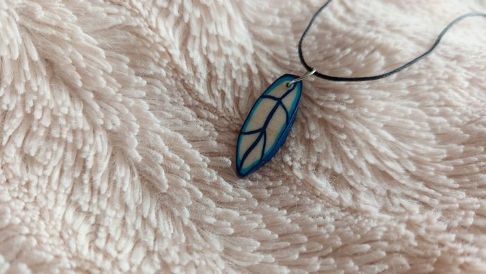 Collier plume 🔄 - photo numéro 4