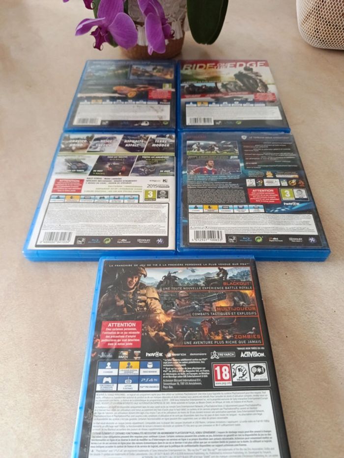 Lot 5 jeux PS4 rocket League PES tt isle, WRC 5 call of - photo numéro 2