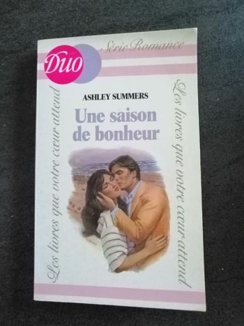 Roman Une saison de bonheur de Ashley Summers en bon état