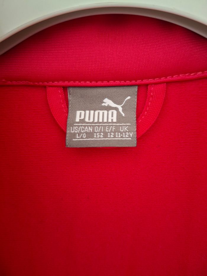 Veste zippée rose et noir col montant 12 ans Puma
2 poches devant et 2 intérieur 
Très bon état ni trous ni tache - photo numéro 5