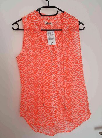 Chemise  flashy sans  manche  taille  36