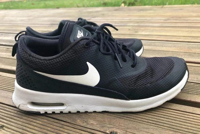 Parfait état - Paire de Nike noire et blanche