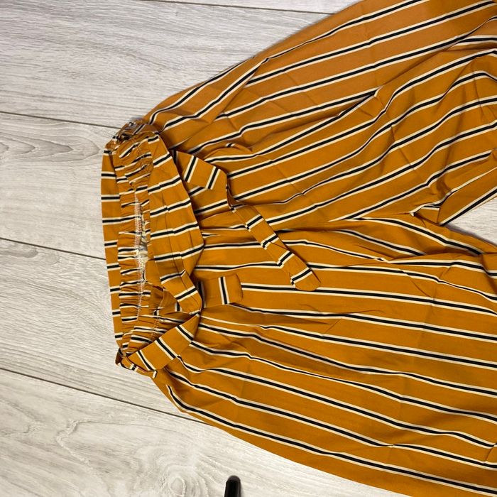 Pantalon jambes larges à rayures
