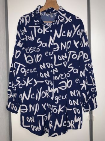 Chemise longue cintrée neuve