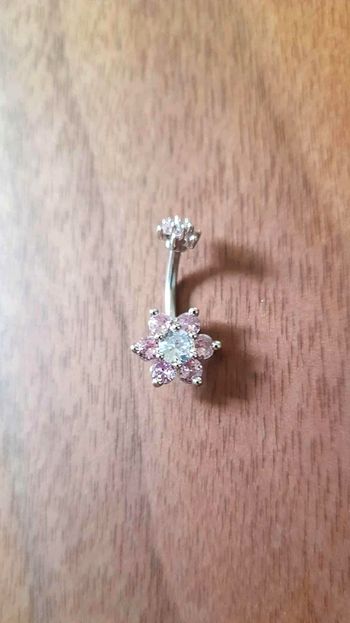 Piercing nombril argenté double fleur zircon – neuf