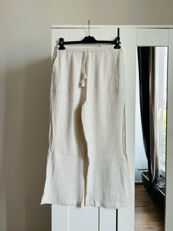 Pantalon large plissé beige uni Stradivarius Taille M