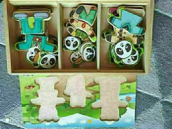 Puzzle en bois la grande famille Okoia