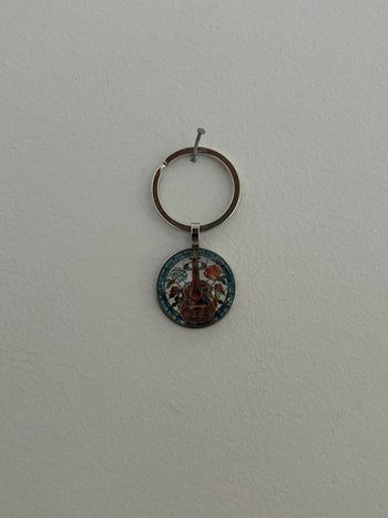 Porte clé guitare neuf jamais utilisé