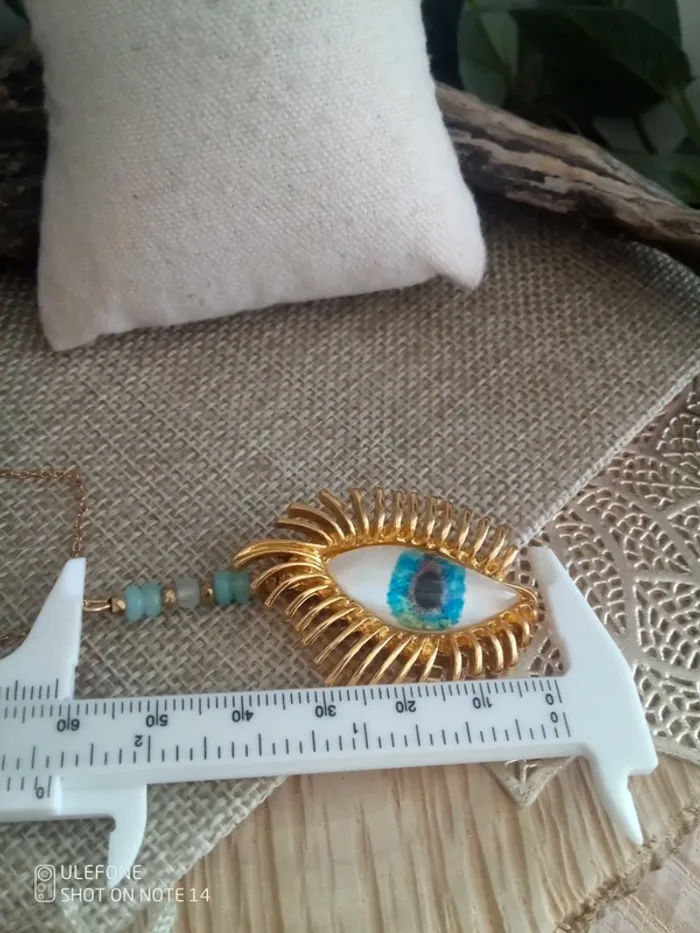 Collier oeil et pierres aigue marine - photo numéro 2