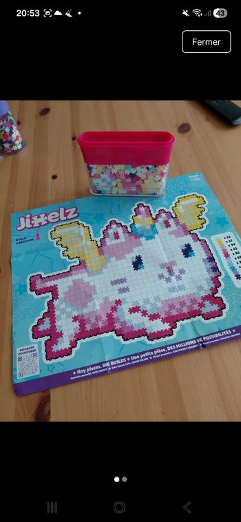 Puzzle jixelz petit modèle en très bon état dans sa boîte d origine modèle narval et chat licorne