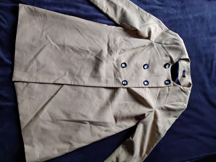 Veste jaune canard qui ne ressort pas sur la photo taille 44