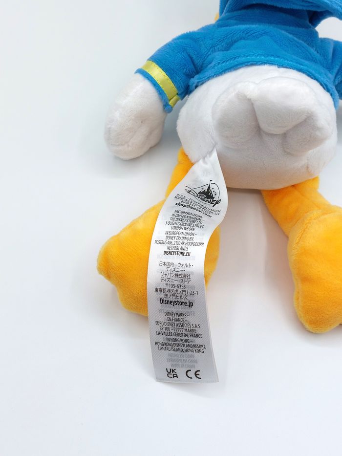 Peluche doudou Donald Duck DISNEYLAND Disneystore noeud rouge 30 cm comme neuf - photo numéro 6