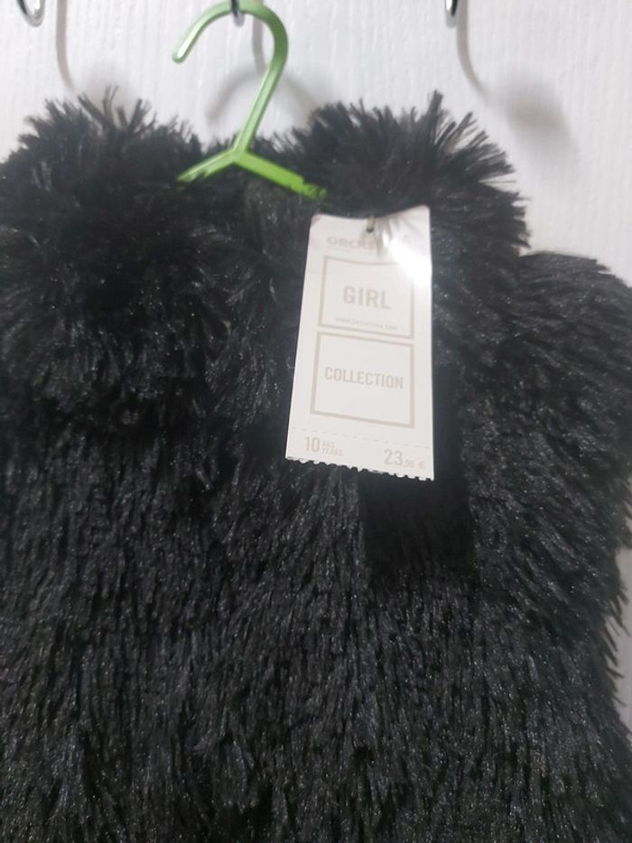 Gilet sans manche neuf avec étiquette 10 ans - photo numéro 2