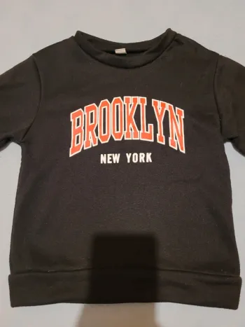 Sweat-shirt taille 7 ans