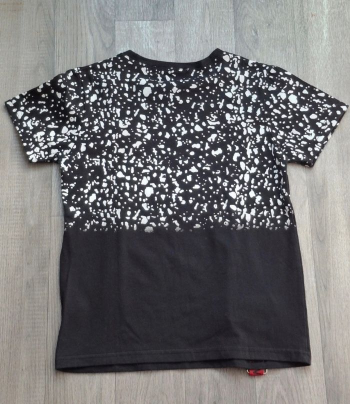 Tee-shirt noir avec motifs éclaboussures blanches style streetwear - photo numéro 3