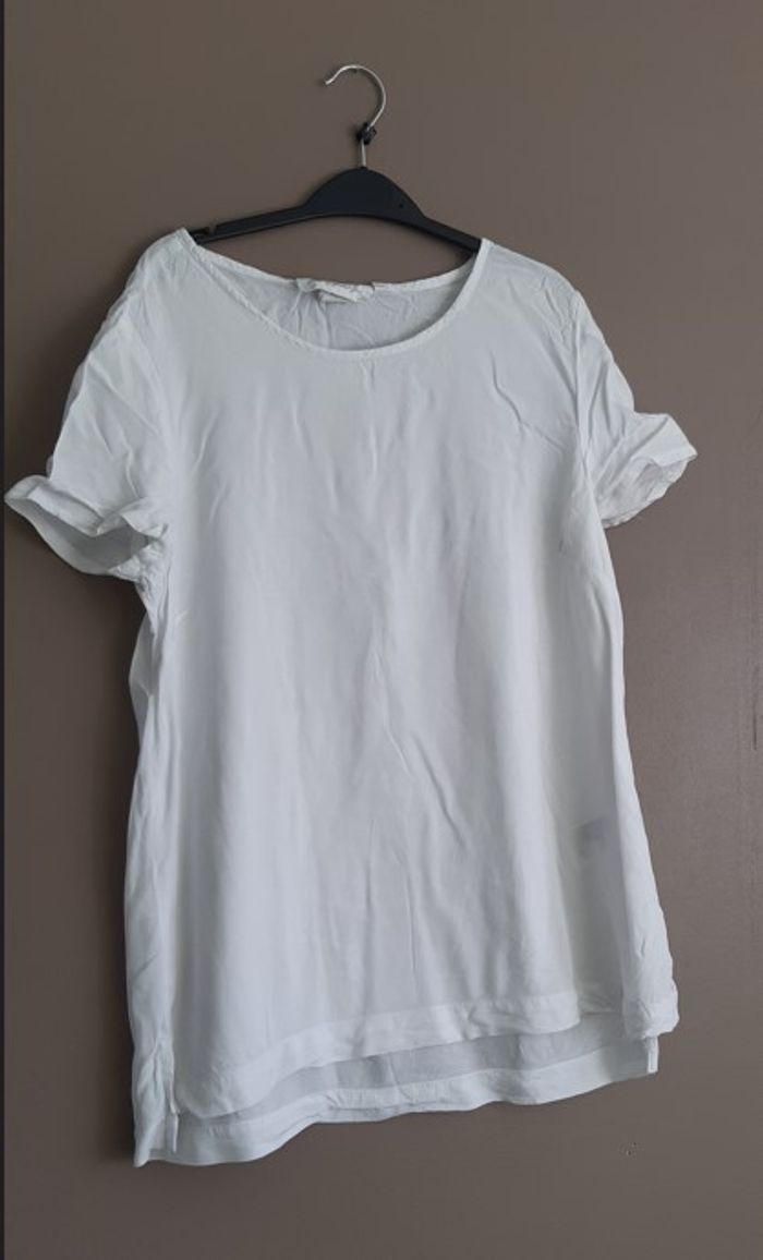 Blouse H&M LOGG, taille 36, blanche.