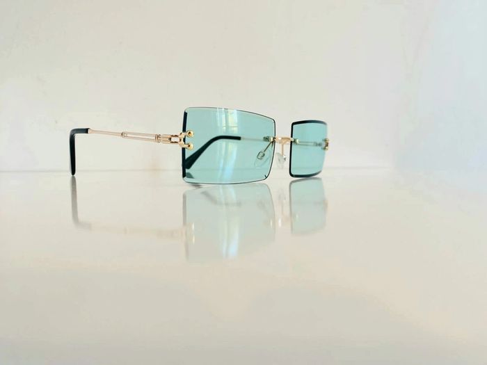 Lunette de soleil mixte percée verres verts uvprotection catégorie 2 - photo numéro 11