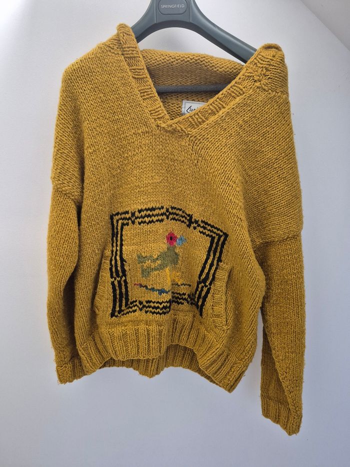 Pull laine a capuche