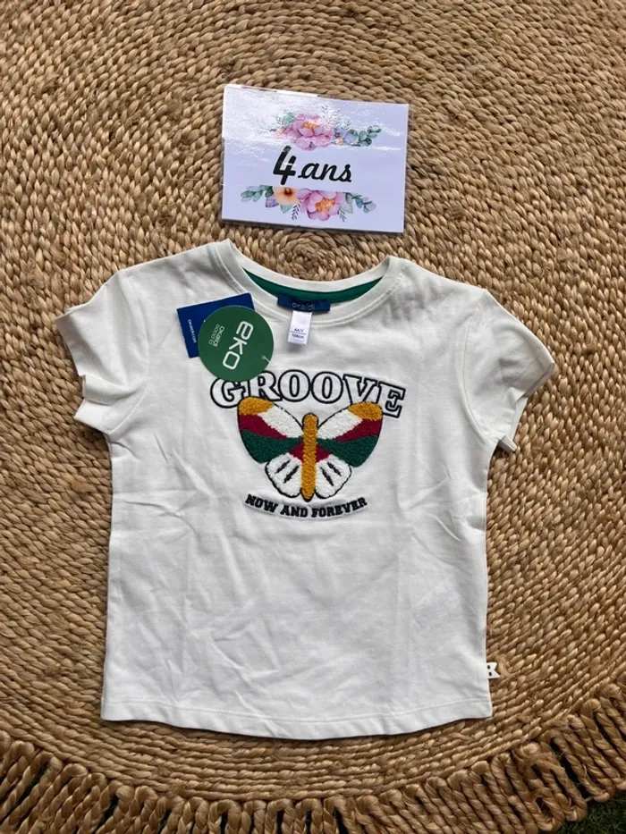 Teeshirt papillon neuf obaibi 4 ans