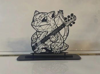 Pokémon Bulbizarre Musicien - décoration géométrique avec support