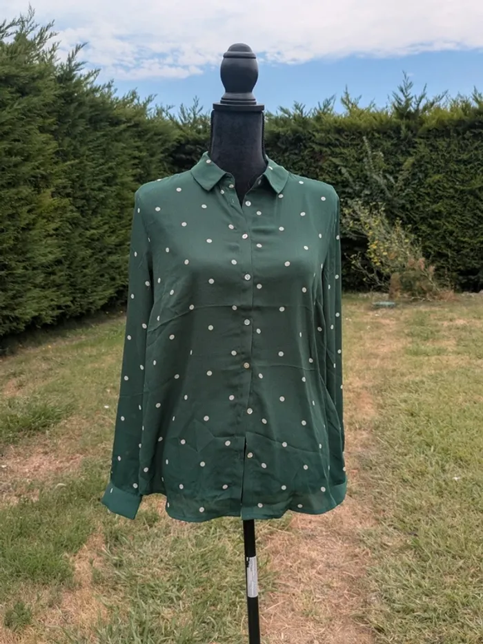 Chemise verte à poids