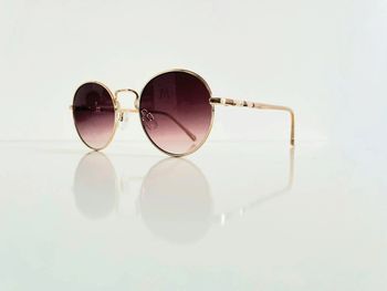 Lunette de soleil femme dorée verres marron dégradés UV protection catégorie 3 taille small