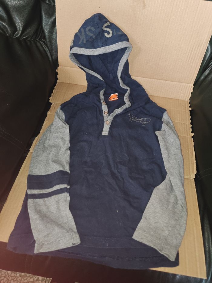 Polo à capuche