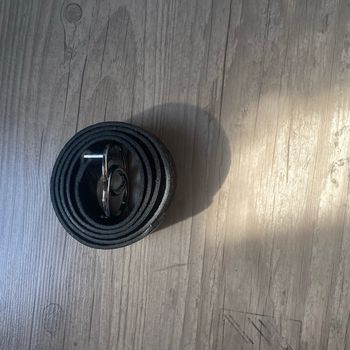 Ceinture noir et argenté motif serpent avec 2 rond.